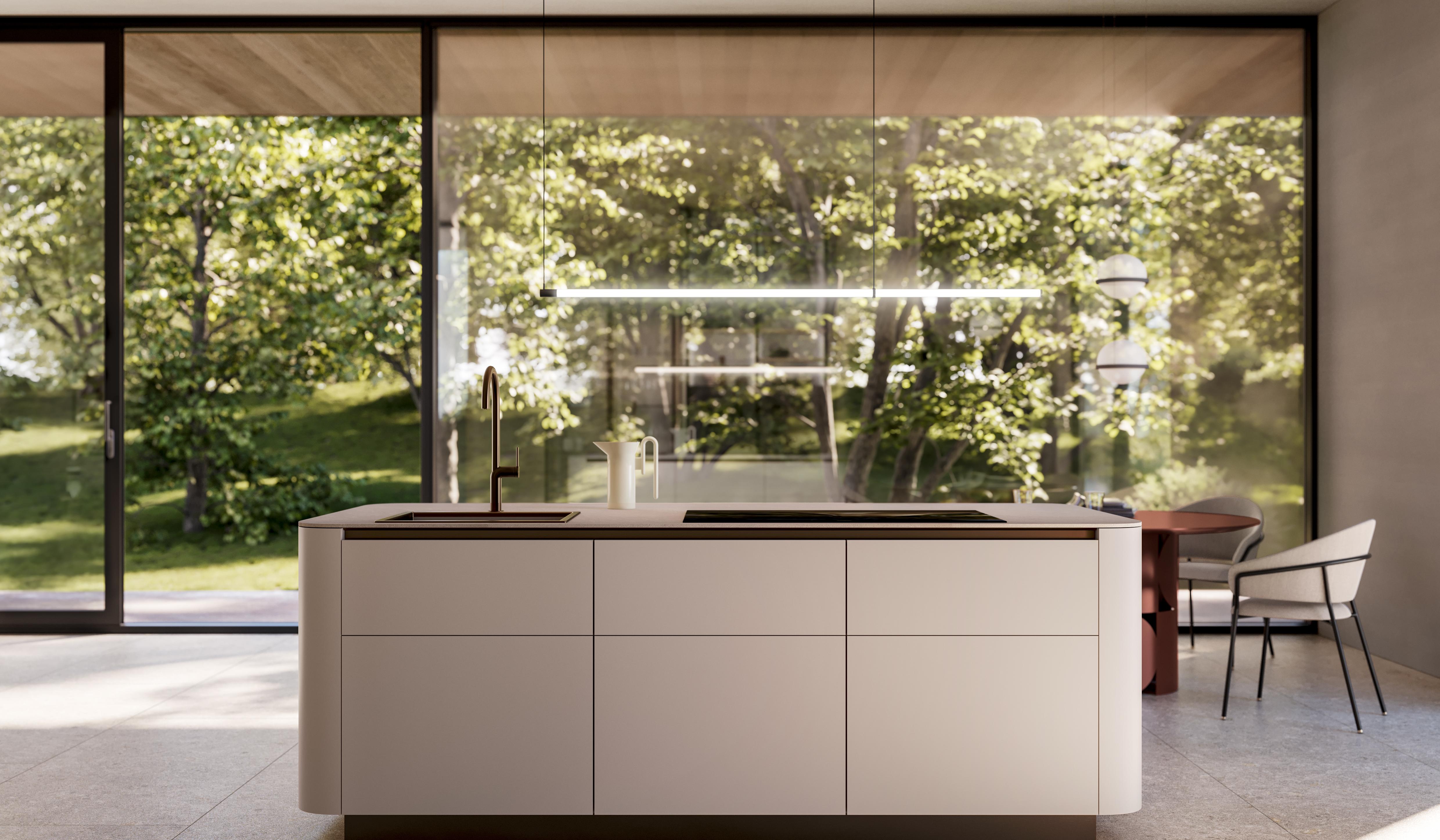 Moderne Küche mit Kücheninsel vor großen Fenstern mit Blick ins Grüne.